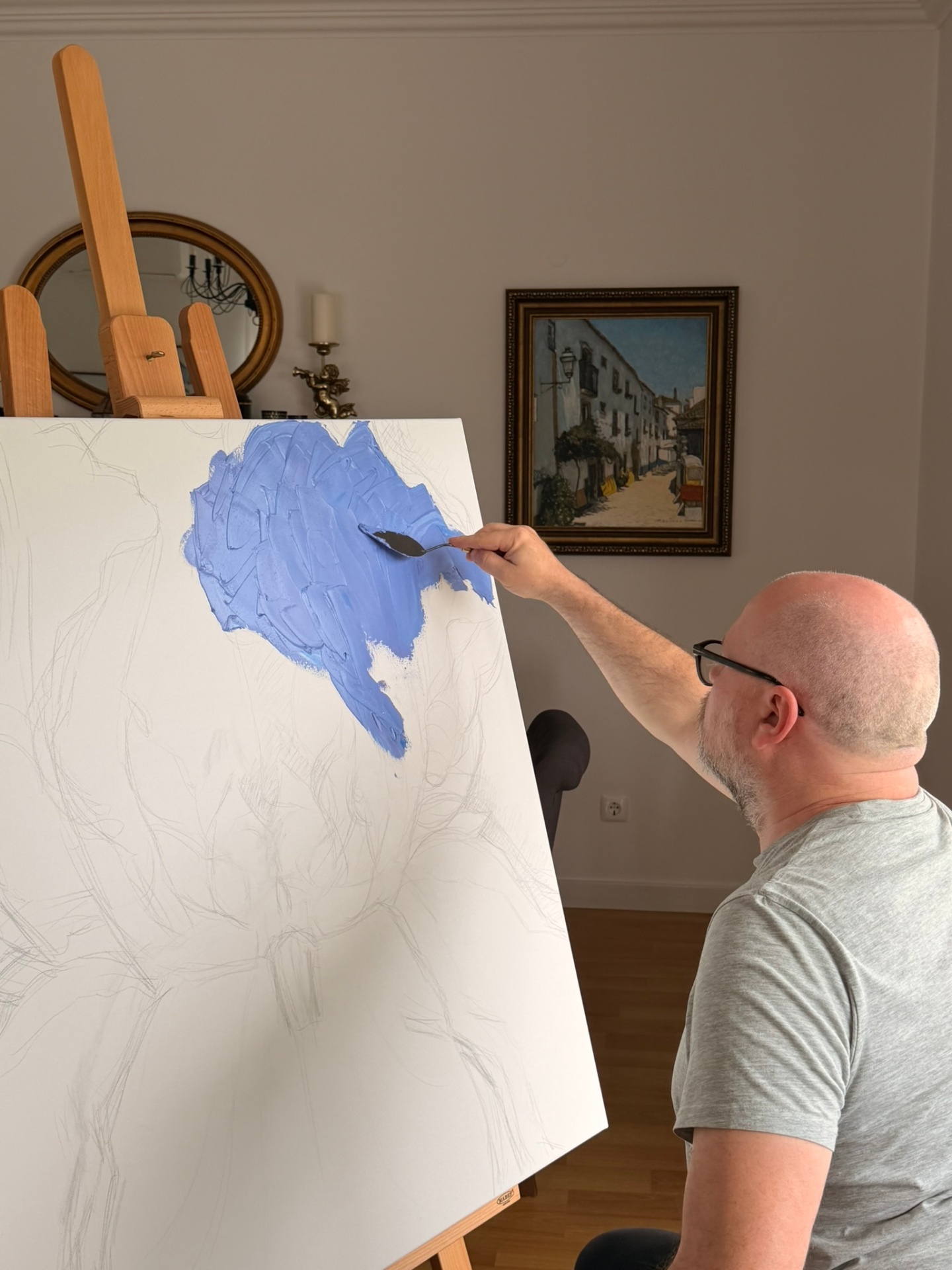 Evgeny Maximov working on the Iris canvas in his studio