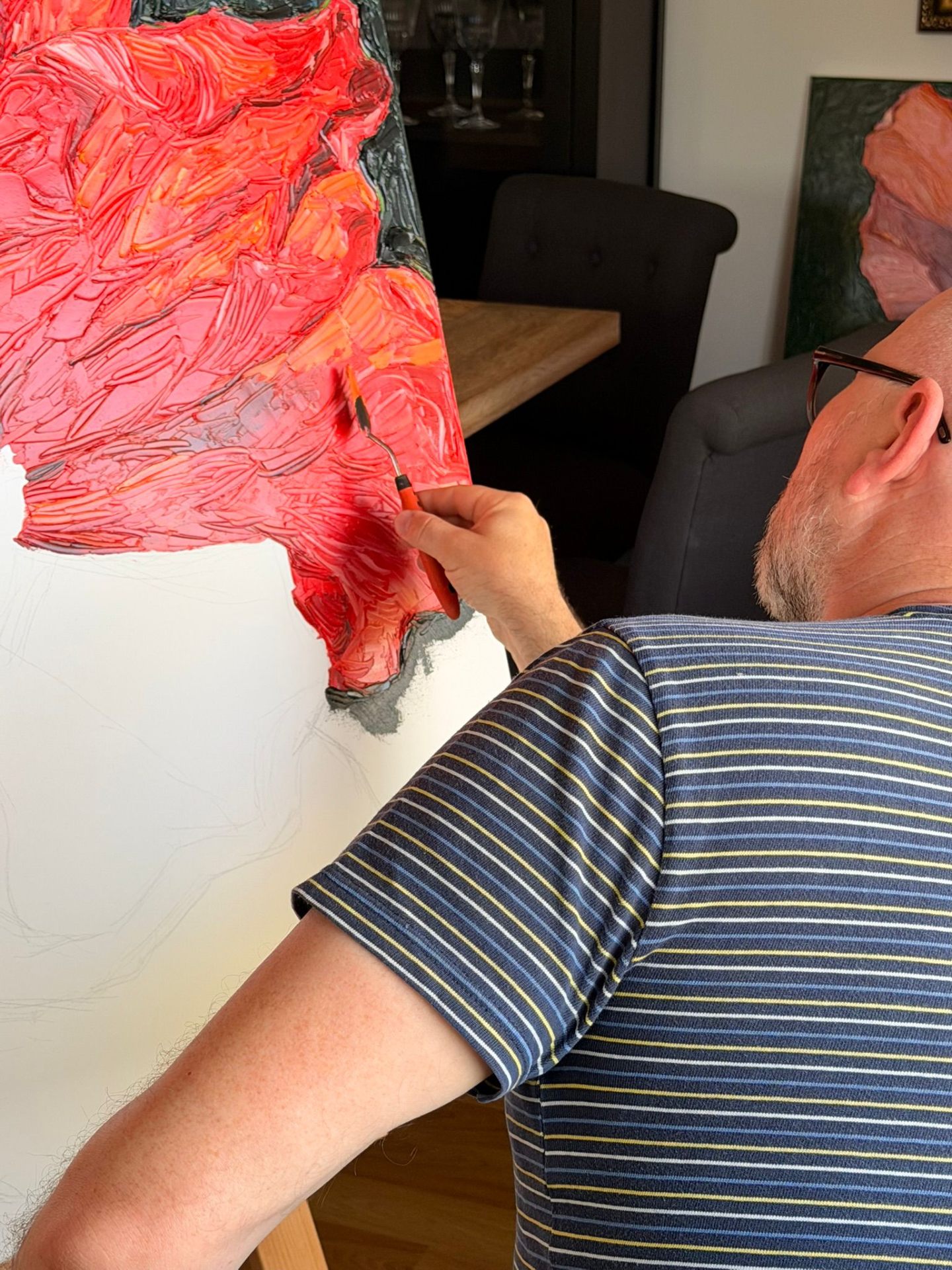 Evgeny Maximov working the scarlet petals of the Poppy with a palette knife